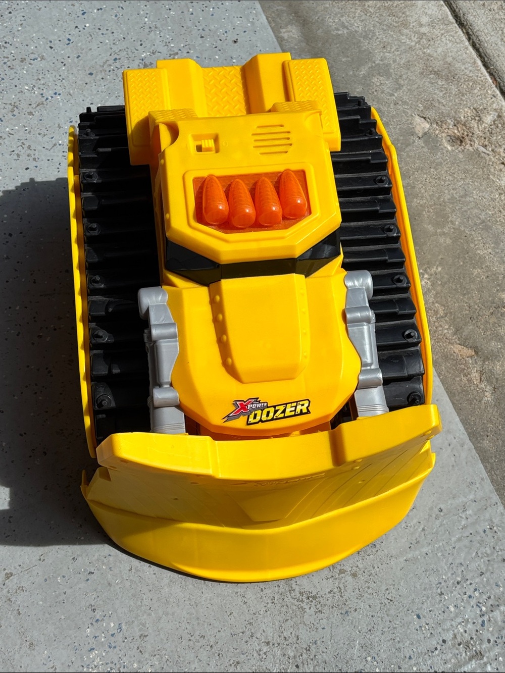 Jakks Pacific Xtreme Power Dozer motorized toy truck.